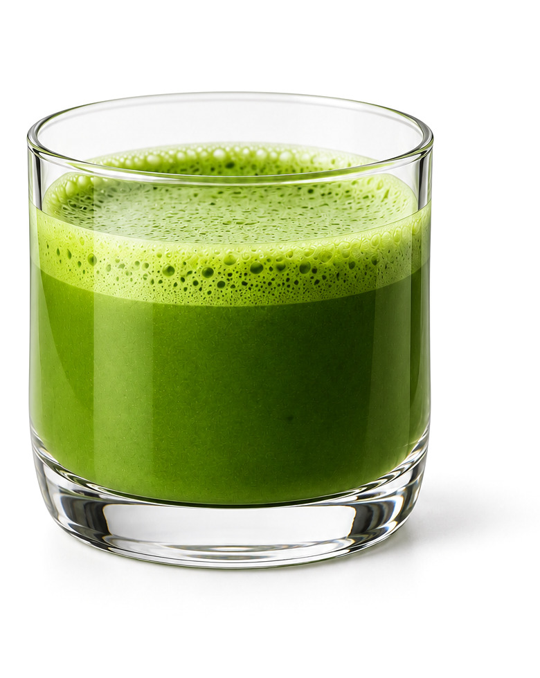 Straight matcha whisked to a fine green foam in a clear glass