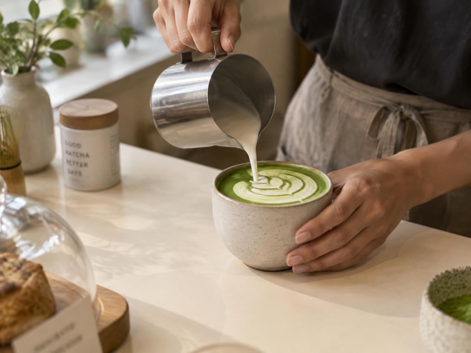 Hot matcha latte with latte art